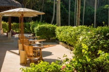 Steps wind down the hill to Amankila’s Beach Club, tucked away in a coconut grove. Facilities include a -metre lap pool overlooked by the restaurant where lunch and snacks can be enjoyed